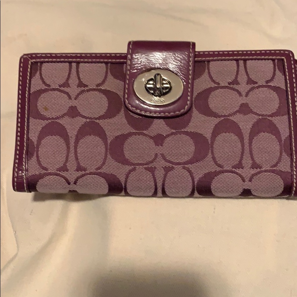 Purple coach wallet .....$100